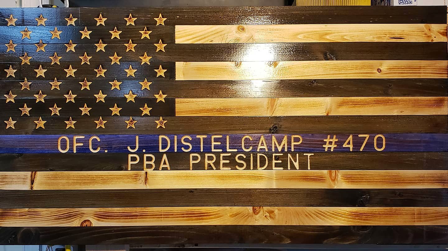 Blue line flag engraved OFC. J. Distelcamp #470, PBA President